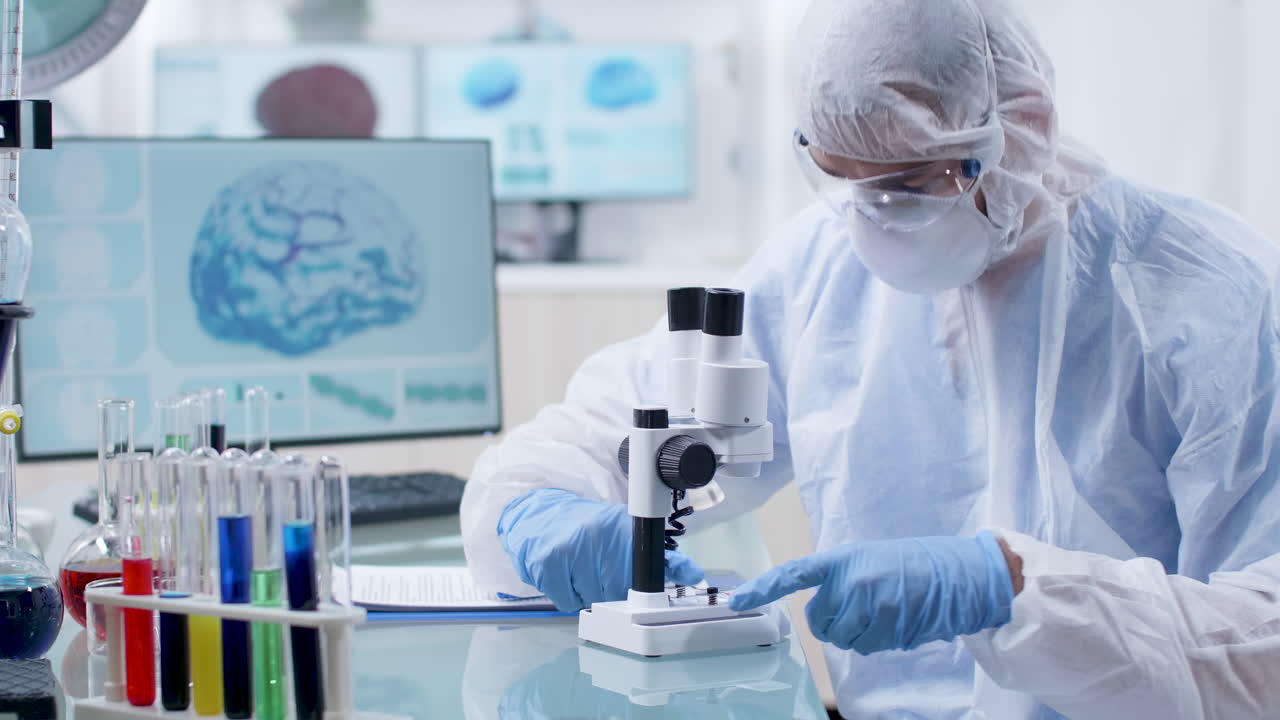 Scientist in laboratory conducting medical research