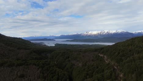 amazing forward aerial movement towards the nahuel huapi lake from the beautiful valley, patagonia, argentina.