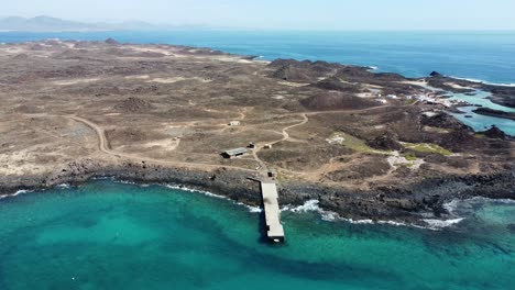 4k,-panning,-drone-footage-of-a-beautiful-aerial-view-of-an-island-of-the-Canary-Islands-known-as-the-Island-of-Wolves