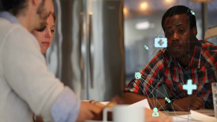 Animation of connected icons forming globe over diverse coworkers discussing reports in office