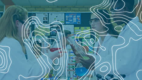 Animation of moving shapes over diverse students in lab
