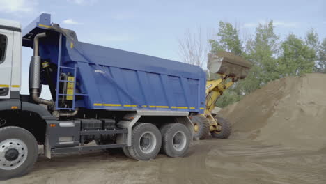 dump truck loading sand