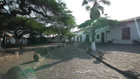 push in shot lens flaring of colonial park in giron santander