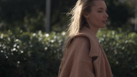 Young-woman-walking-in-the-park.