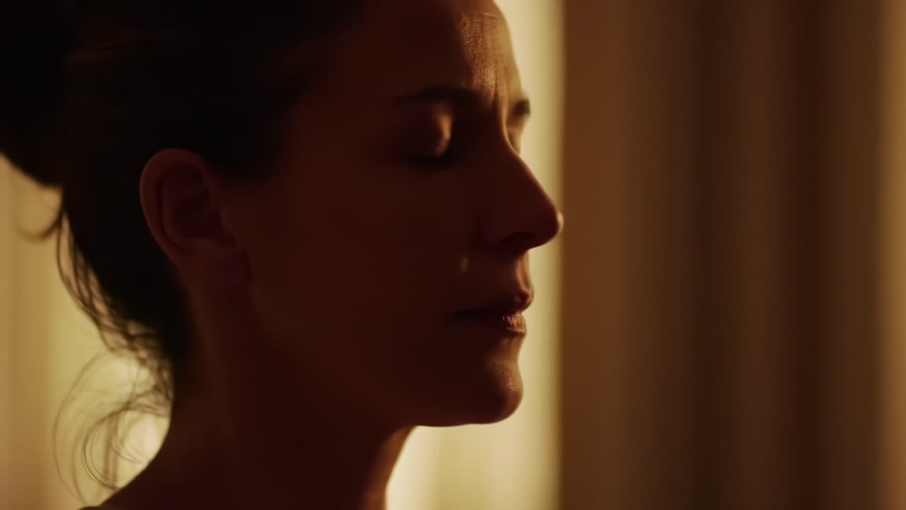 A Serene Moment of Reflection and Calmness: A Subject Deep in Thought, Bathed in Soft, Warm Light Inducing Tranquility and Peacefulness in a Quiet Space