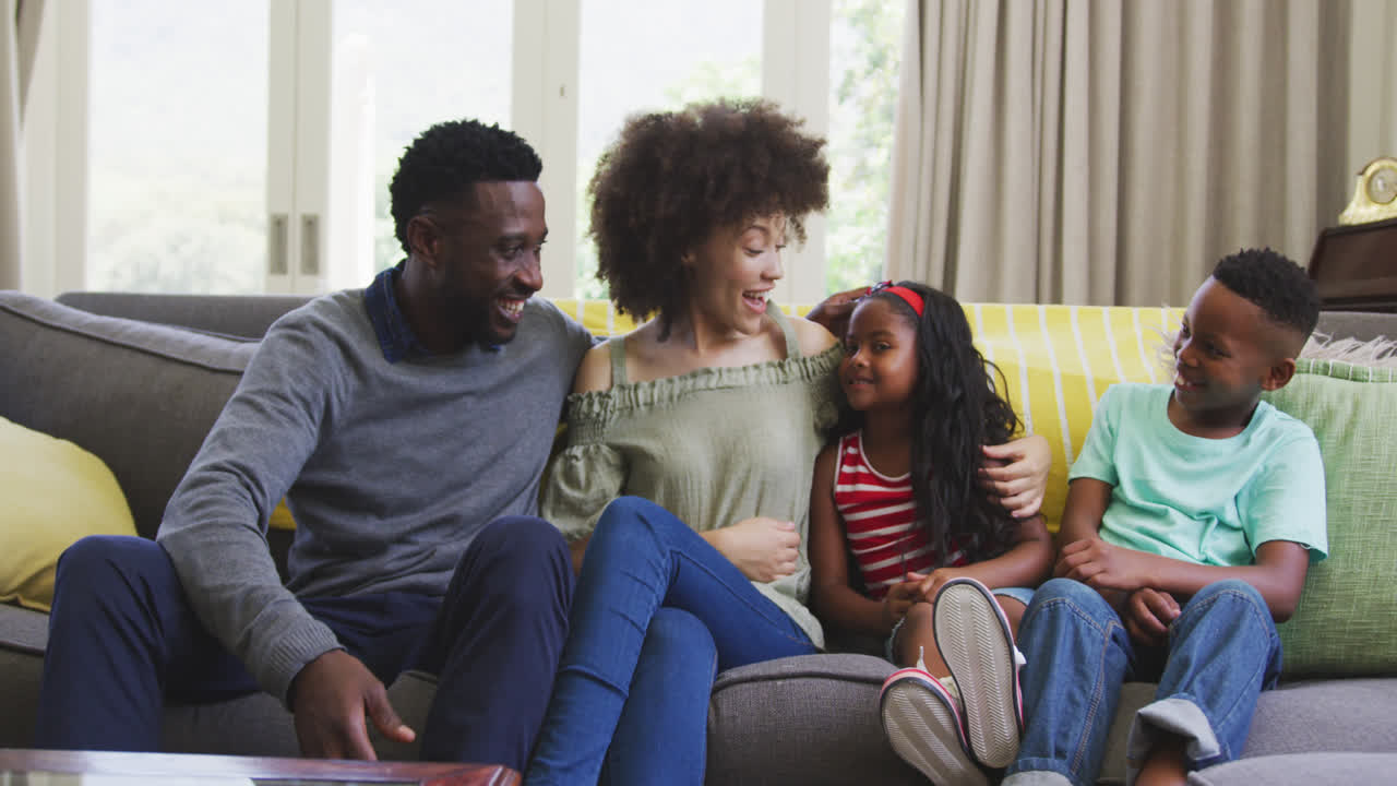 Happy family spending time together at home