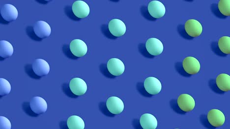 huevos de pascua coloridos girando en filas en bucle sin costuras en fondo azul