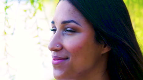 Portrait-of-a-happy,-young-woman-outdoors