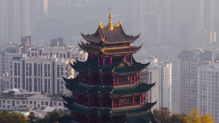 Hong'en Pavilion With City Skyline In The Background During Sunset In Chongqing, China. Aerial Close-up Shot