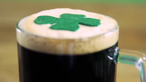 Close-up-view-of-head-of-a-pint-with-shamerock-for-st-patricks-day