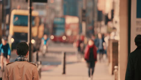 Anonymous-crowd-of-people-walking--commuters-London-City-street-slow-motion