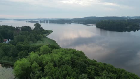 Flying-drone-in-cloudy-morning-one-the-lake