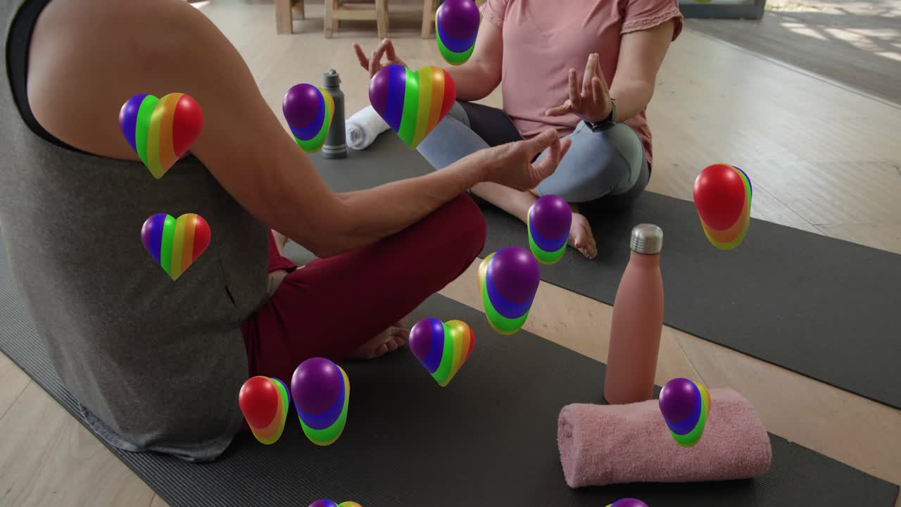 Women doing yoga right shifting to mudra, left mirroring to meditate, rainbow hearts between