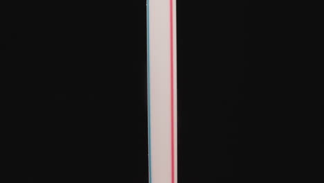 plastic straw with pink and blue stripes designed for drinks