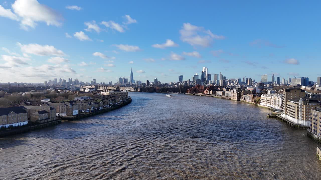 Low Aerial River Thames East London view of City skyline