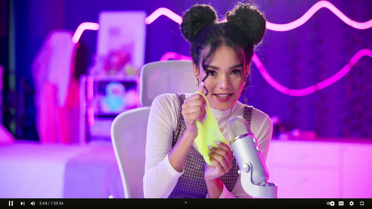 Woman playing with slime on her vlog