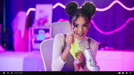 woman playing with slime on her vlog