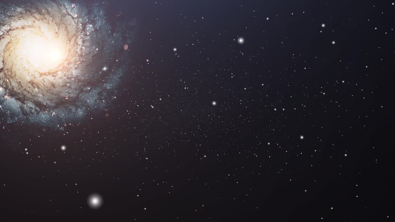 a galaxy spinning and crossing the stars