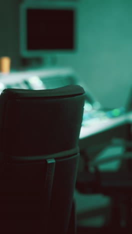 a close-up of a professional audio mixing console in a recording studio