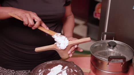 making some idiyappam, a traditional dish in sri lanka