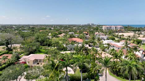 aerial fast push over homes and boats in boca raton florida