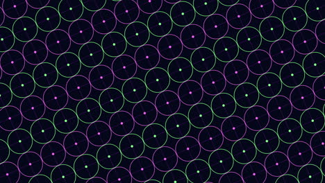matriz simétrica de círculos superpuestos en púrpura y azul sobre un fondo negro