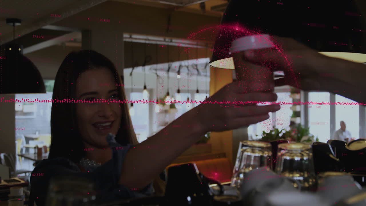 Woman reaching for coffee from barista in business cafe, showing red digital data overlay graphics