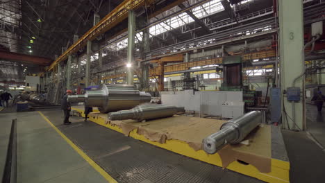 metal rolling process in industrial setting