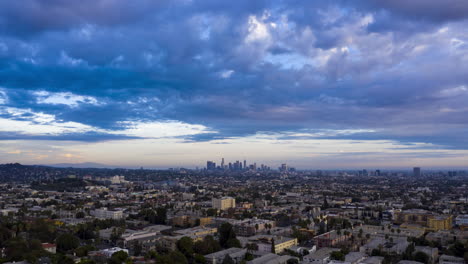 drone hyperlapse over hollywood with downtown skyline in the distance