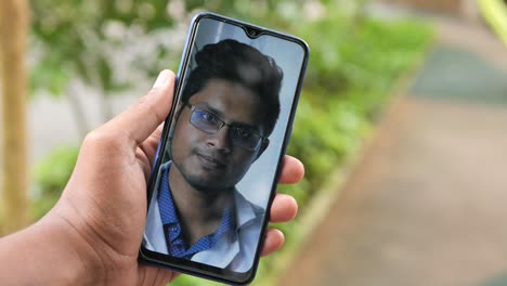 Men-taking-online-consultation-with-doctor-on-smart-phone-,