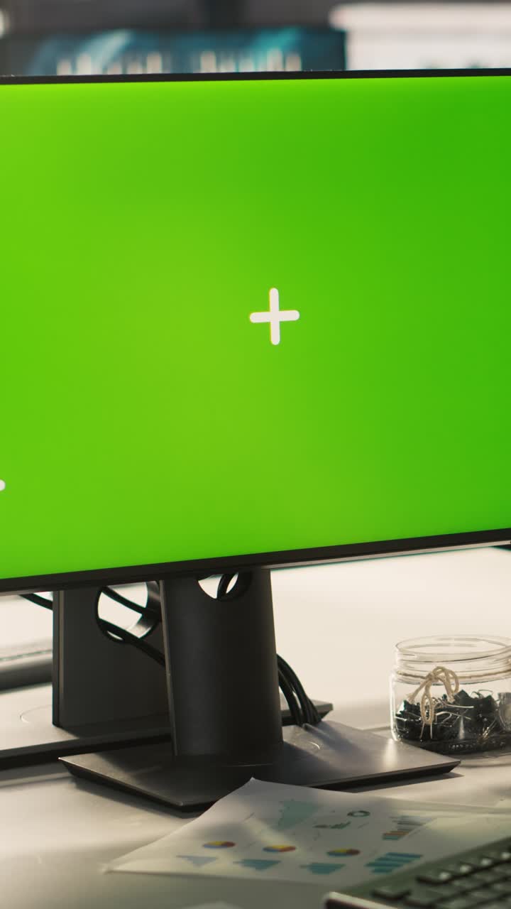 Vertical video Green screen PC used by employee preparing for business meeting