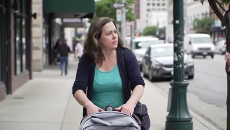 a concerned mother navigates the busy streets, pushing a stroller and observing her surroundings with careful attention and thoughtfulness