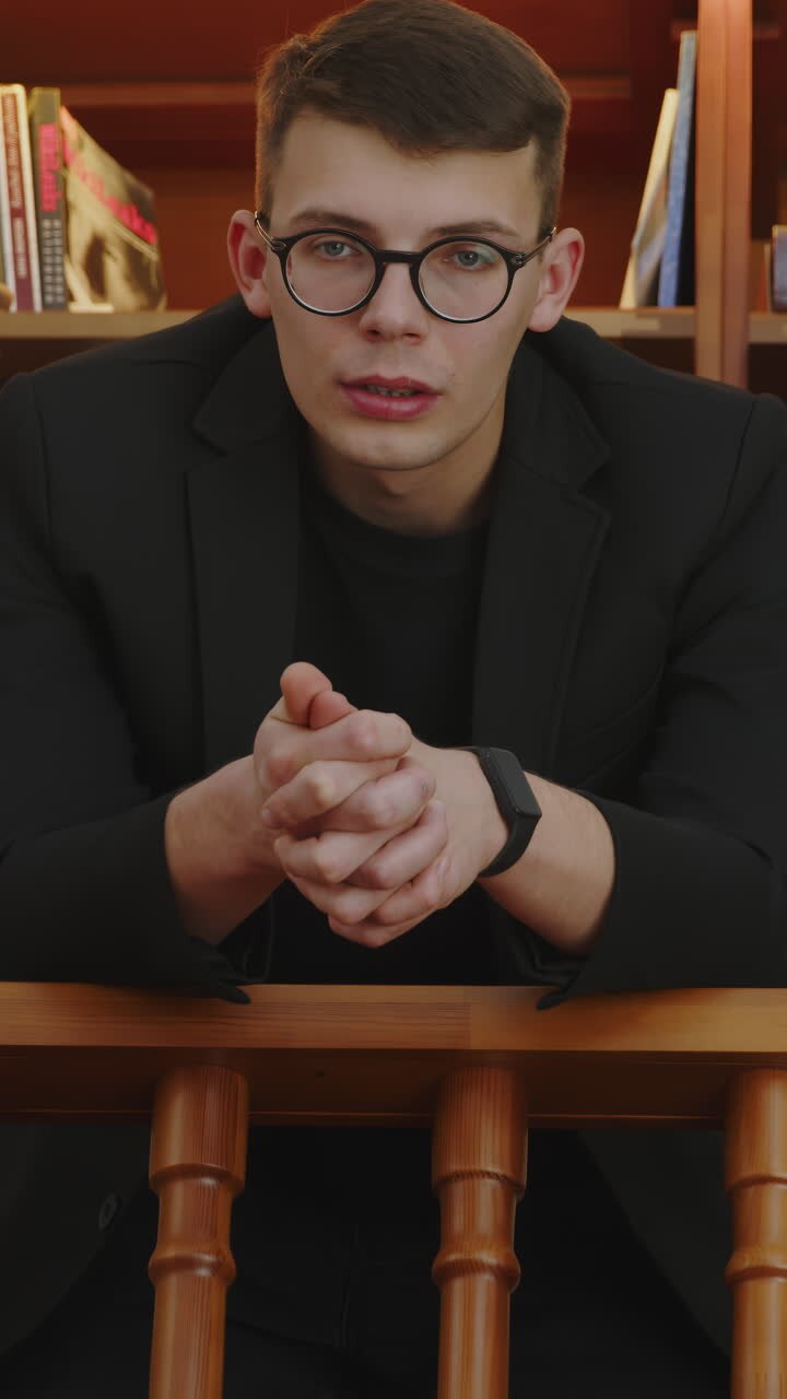Young Man in a Library