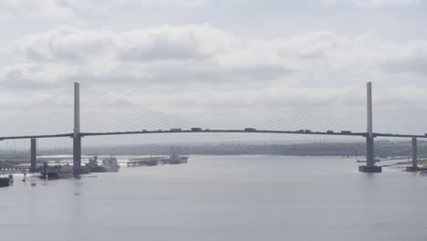 drone-shot-of-traffic-crossing-over-Queen-Elizabeth-II-Bridge-,-Dartford-Thurrock-River-Crossing