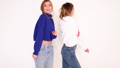 two teen girls dancing