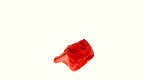 tela roja envuelta en un fondo blanco