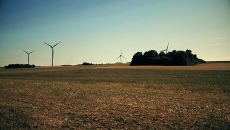 -Shot-of-a-wind-turbines-slowly-spinning-and-creating-renewable-energy,-4K