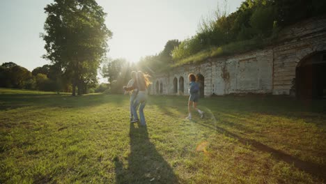 friends enjoying a sunset walk in park