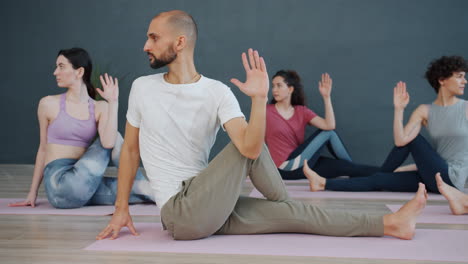 yoga class - spinal twist pose