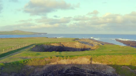 Shadow walking on a natural arch in the west of Ireland. Perfect shot for visual storytelling and character development