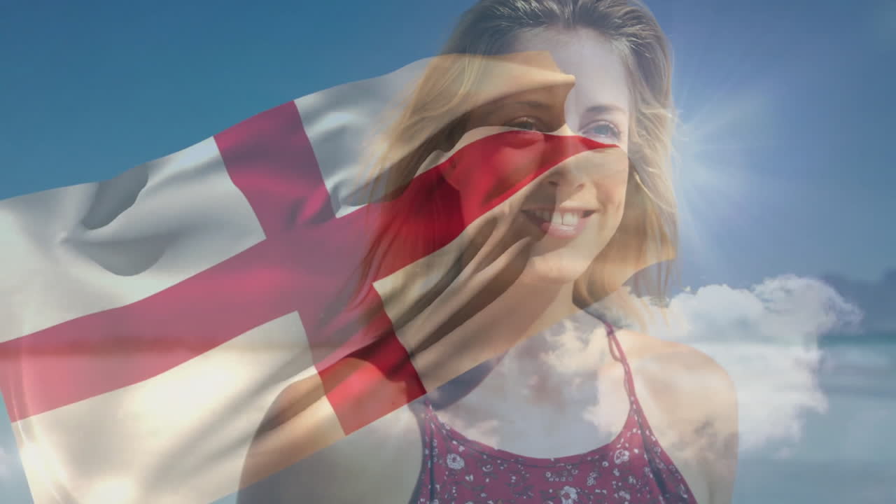 Holding England flag animation, woman smiling against blue sky background