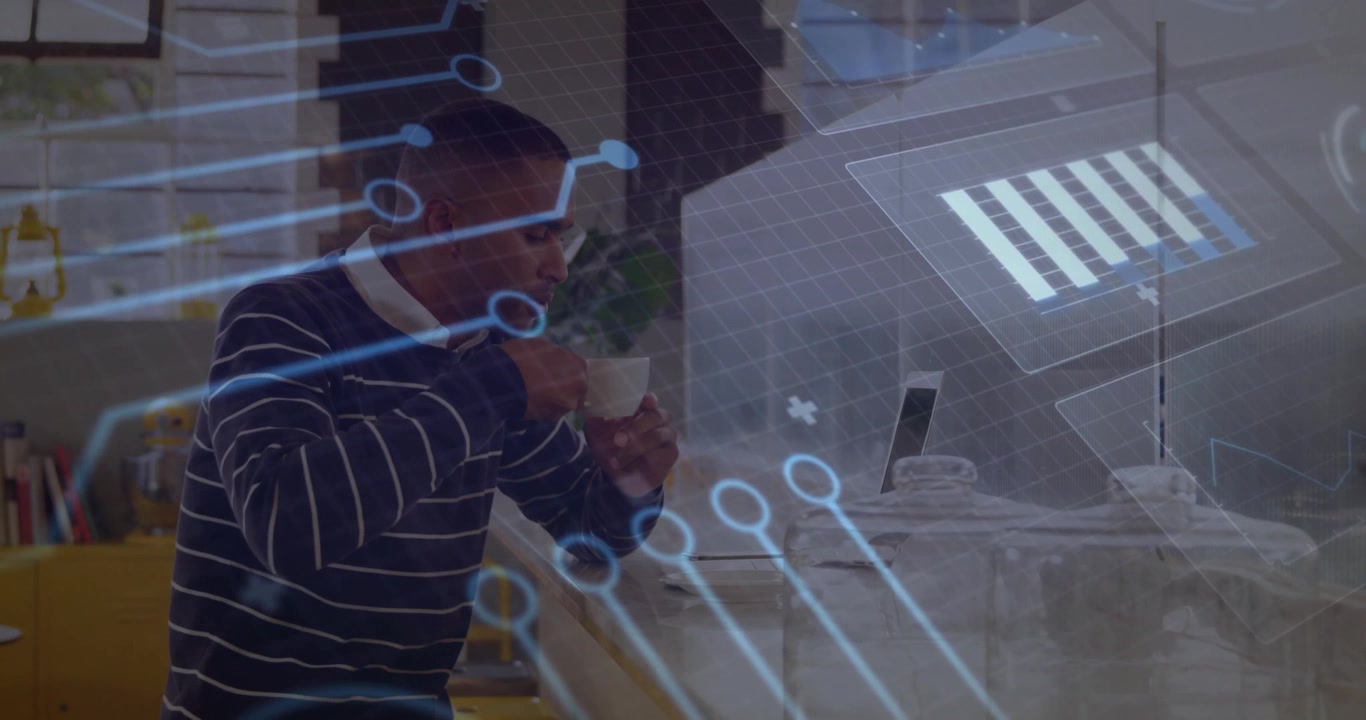 Man using laptop and smartphone in modern office, with animated technology network overlays