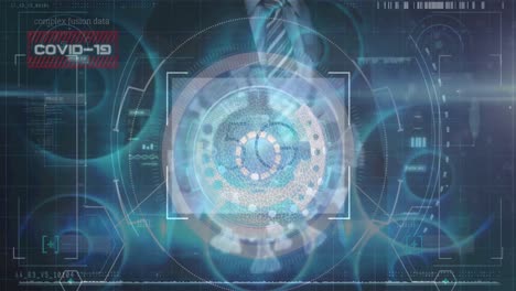 animación de escaneo de alcance y célula de virus sobre hombre de negocios caucásico y procesamiento de datos