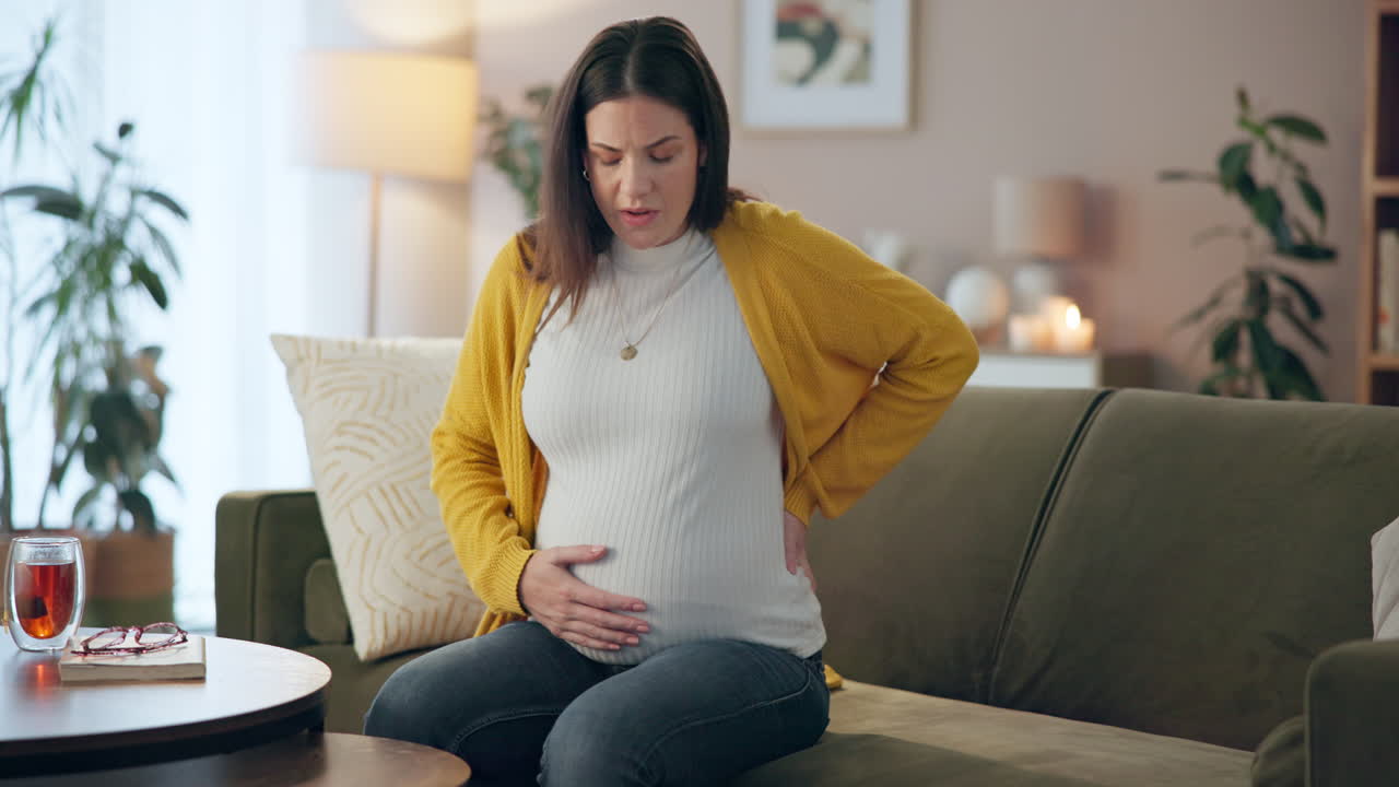 Pregnant woman suffering from back pain