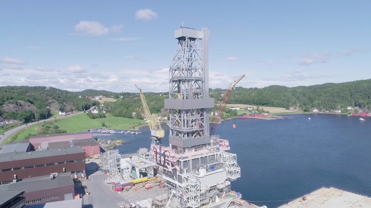 Aerial Slomo shot Pan around a Small Loading Dock in Norway, during Sunny weather