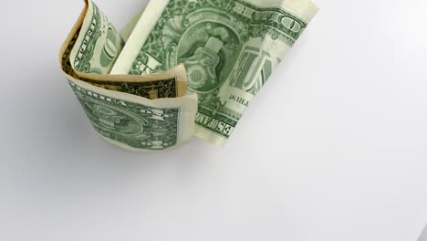 el cerdo giratorio y el dinero
