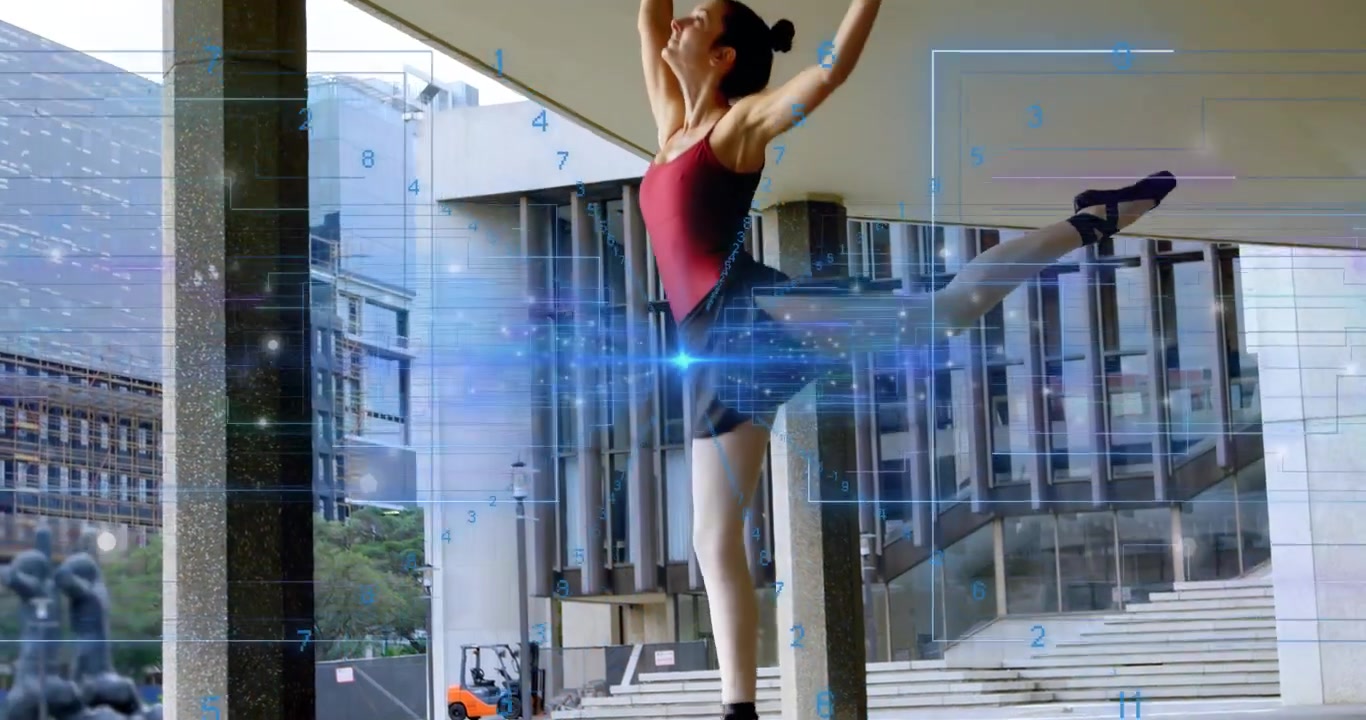 Mid-adult woman ballet dancer rising on pointe in arabesque touching column with blue grid at plaza