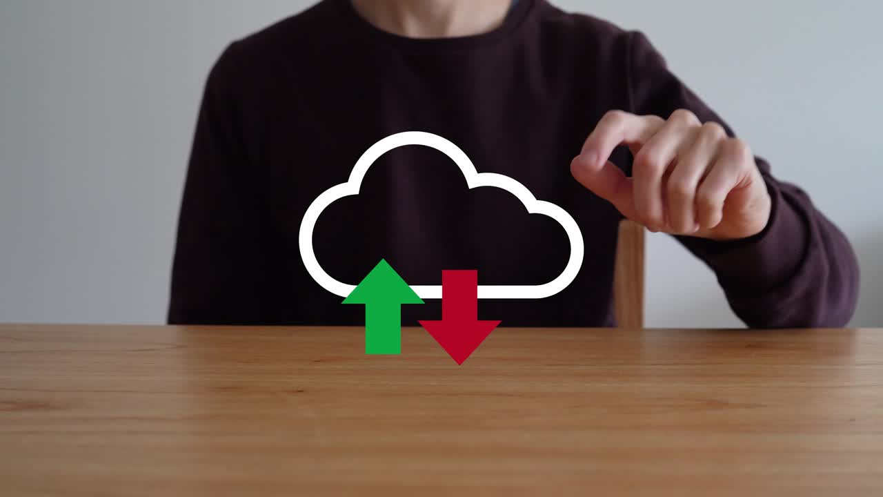Person Taps The Cloud Icon With Upward pointing And Downward pointing Arrows - Symbol Of Cloud Storage And Data Transfer. - closeup shot