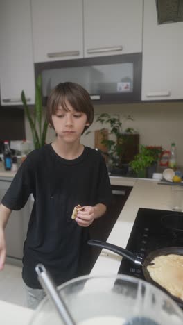 boy making pancakes