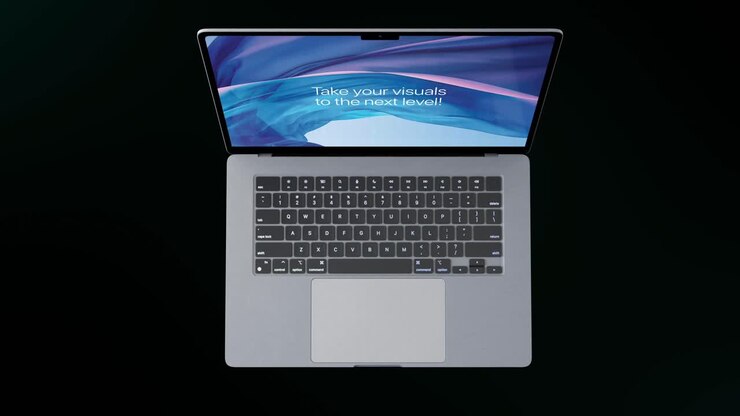 Modernes Laptop mit beleuchteter Tastatur auf dunklem Hintergrund